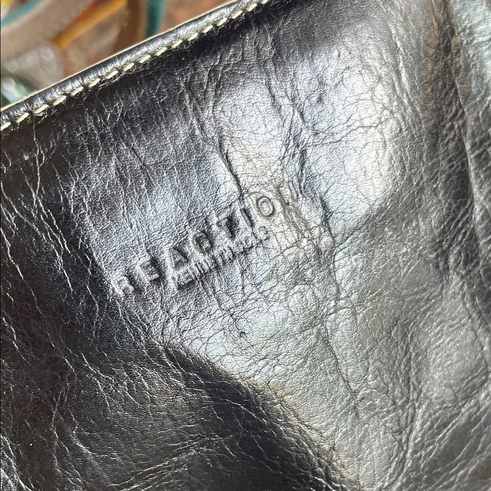Reaction Kenneth Cole sleek black